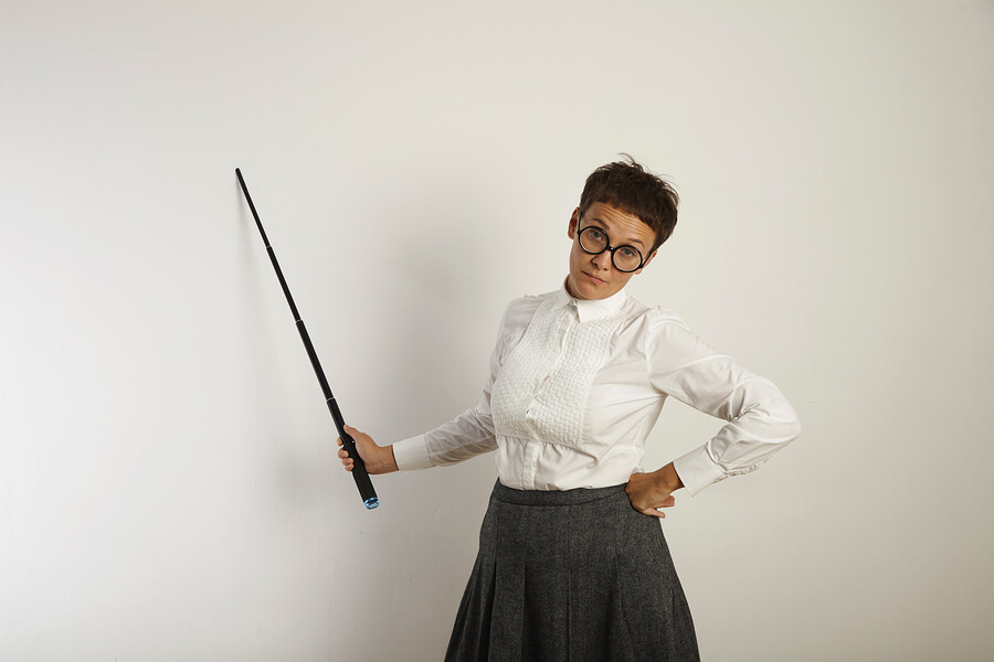 A teacher with her pointing staff